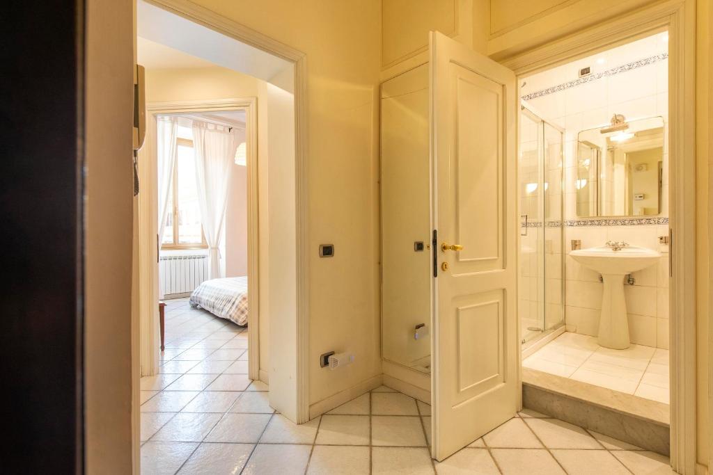 Kúpeľňa v ubytovaní Redseven Rome Apartments