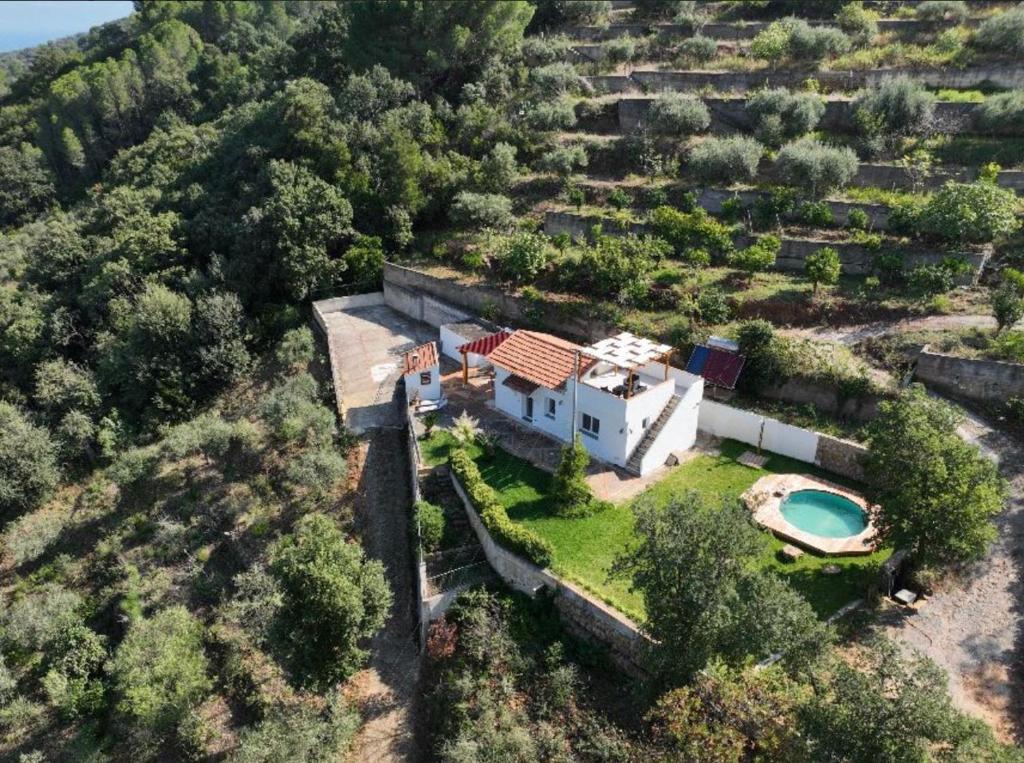 an aerial view of a house with a swimming pool at Holiday Apartment Villa Camilla in Cefalù