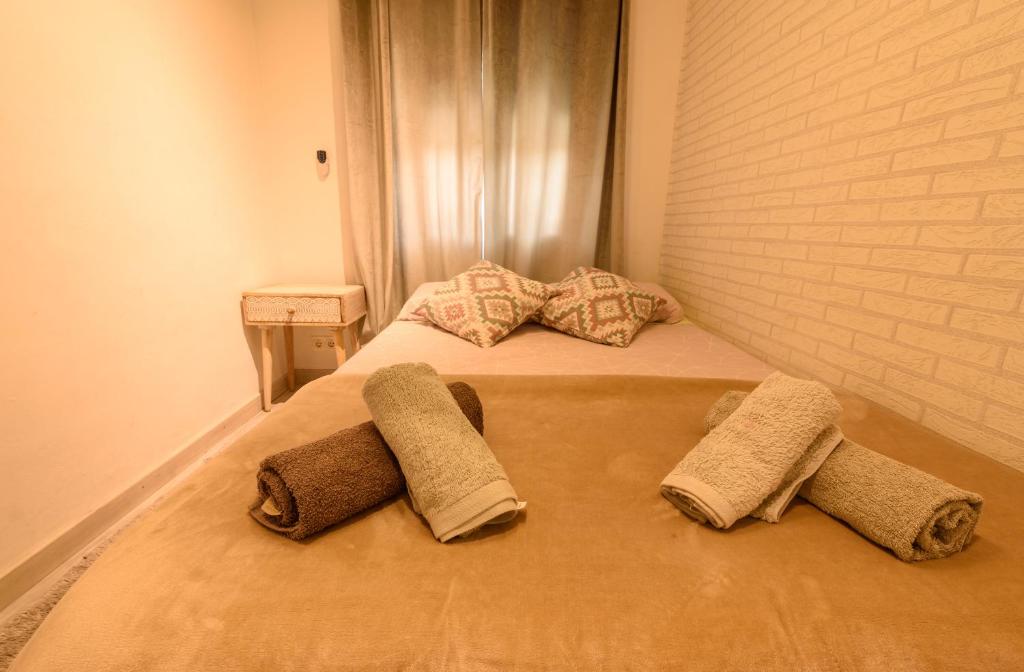 A bed or beds in a room at Apartamento Reisol