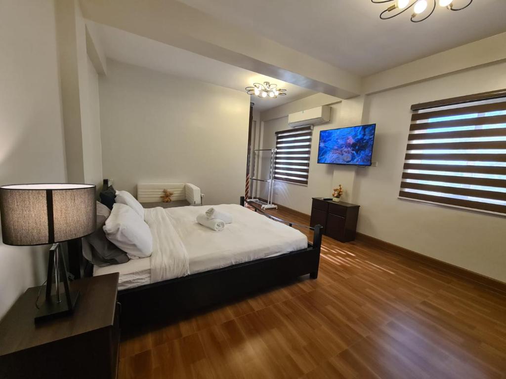 Postel nebo postele na pokoji v ubytování Azure Ocean View Villa