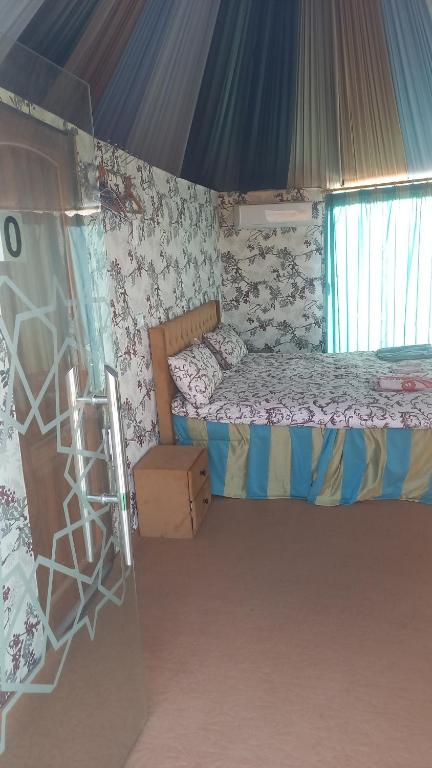Postel nebo postele na pokoji v ubytování Sultan Luxury Camp