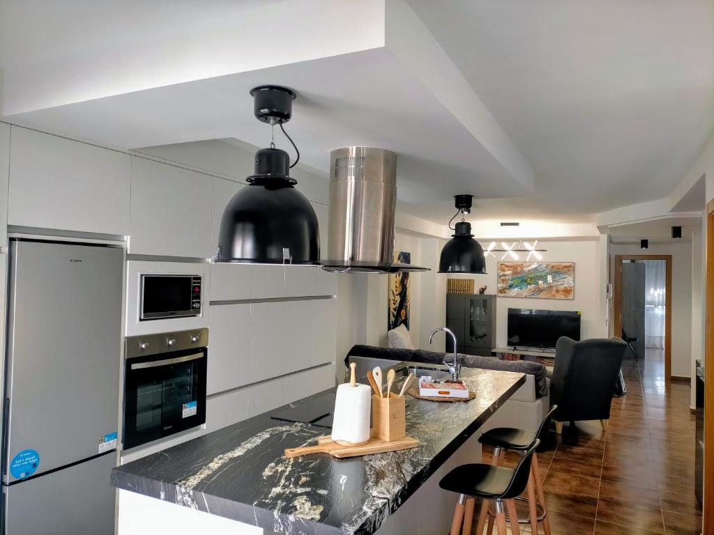 a kitchen with a counter top in a room at Piso turistico el Sol VUT-983 in Astorga