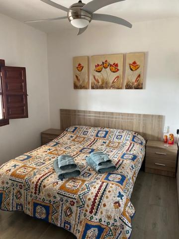 Postel nebo postele na pokoji v ubytování LO TROS