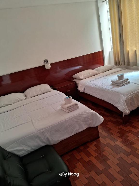 Postel nebo postele na pokoji v ubytování COPACABANA