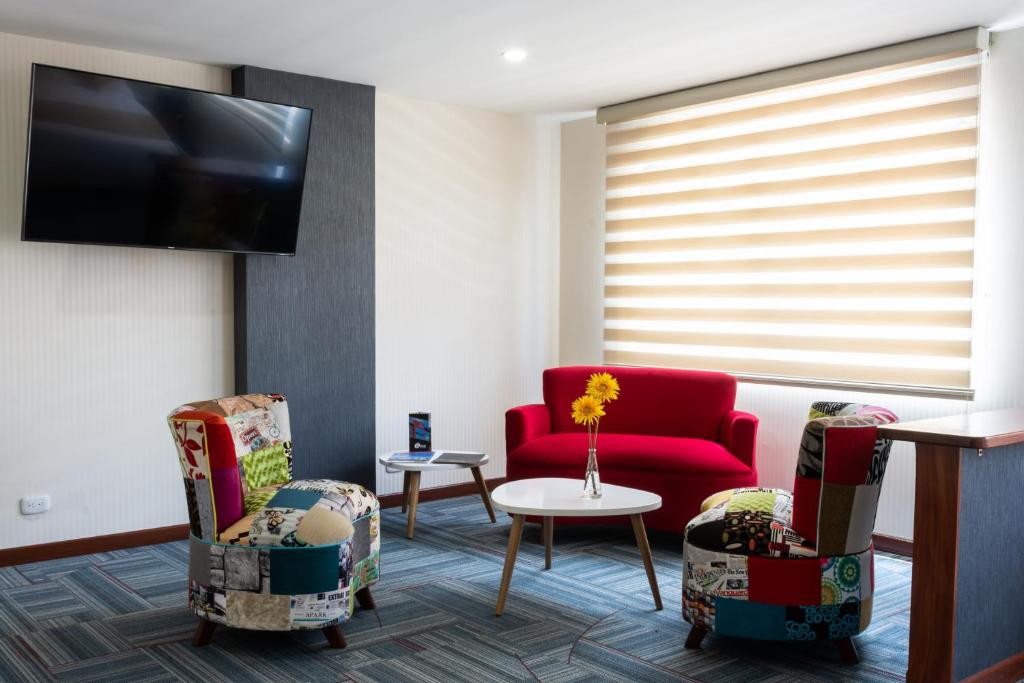 TV a/nebo společenská místnost v ubytování Hotel Risot