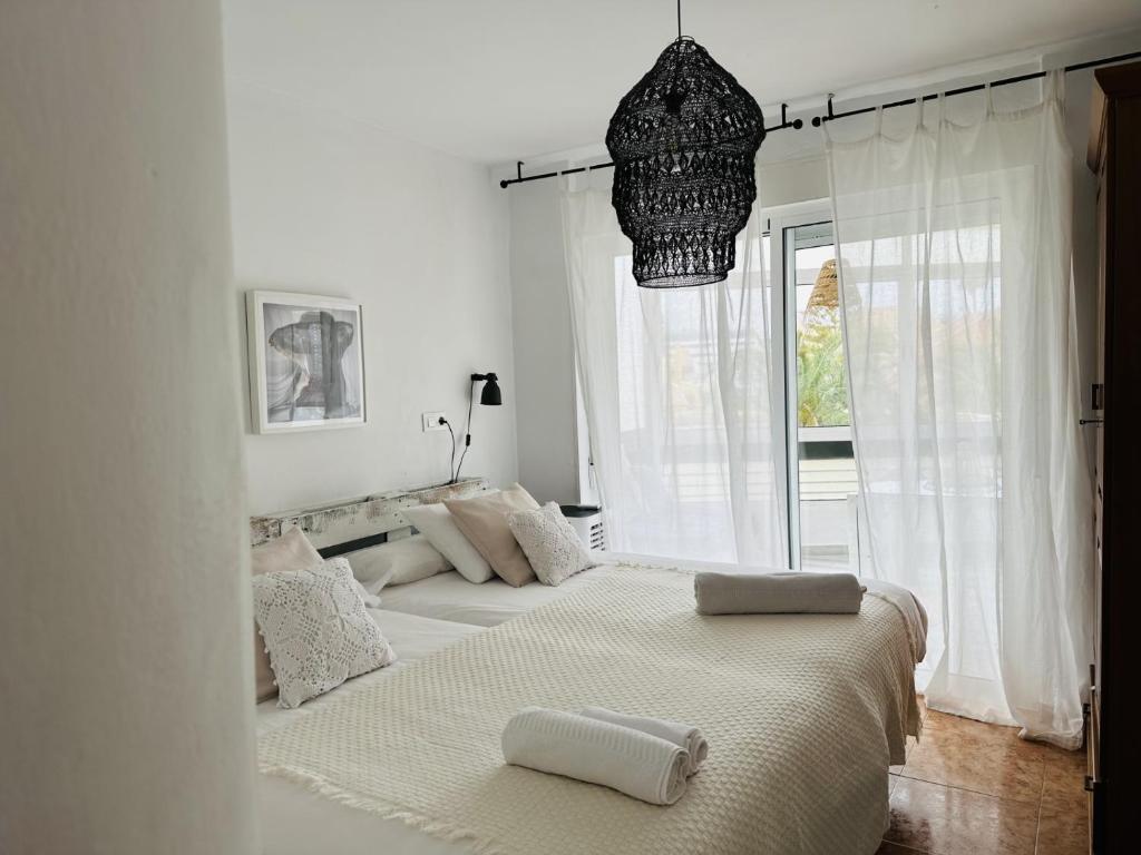 Posteľ alebo postele v izbe v ubytovaní Charming & cosy beach apartment