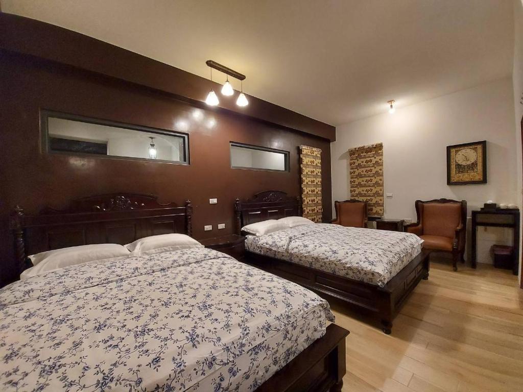 Postel nebo postele na pokoji v ubytování 出門獺踏 Otter footprints B&B