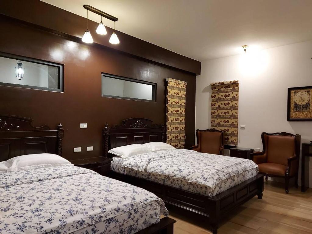 Postel nebo postele na pokoji v ubytování 出門獺踏 Otter footprints B&B