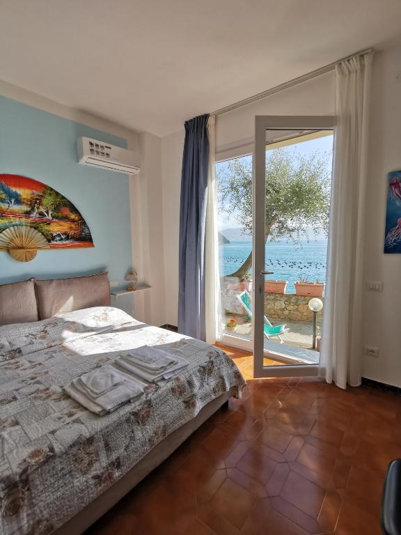 Postel nebo postele na pokoji v ubytování B&B La Palafitta