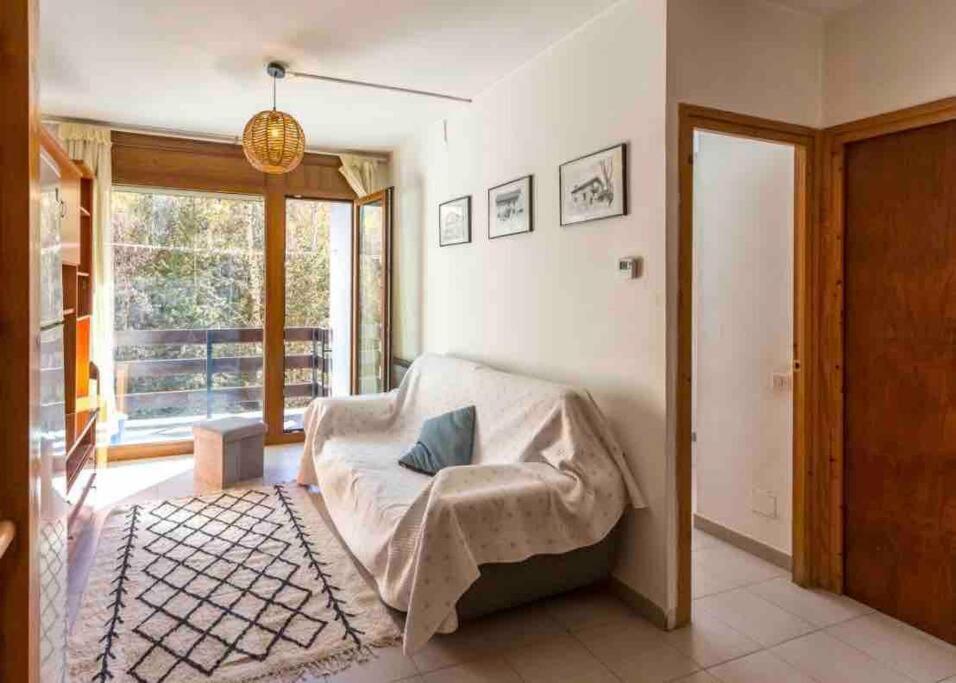 Postel nebo postele na pokoji v ubytování Apartamento de montaña junto al rio ,pistas de ski y parque natural