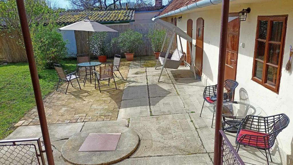 Patio nebo venkovní prostory v ubytování Neubauer Vendégház*** Mohács