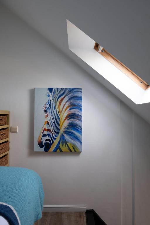 Postel nebo postele na pokoji v ubytování B&B De Joker