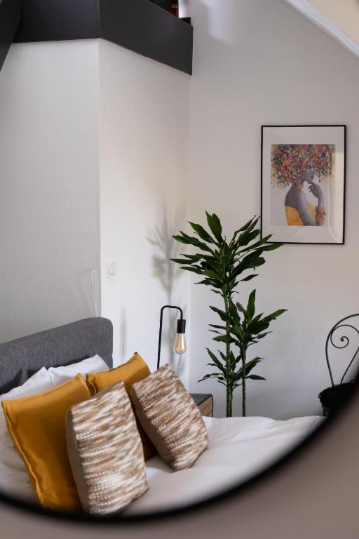 Postel nebo postele na pokoji v ubytování B&B De Joker