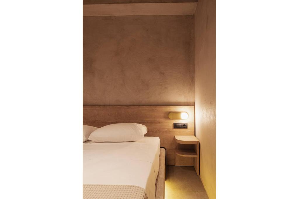 Łóżko lub łóżka w pokoju w obiekcie Medusa Luxury Suites