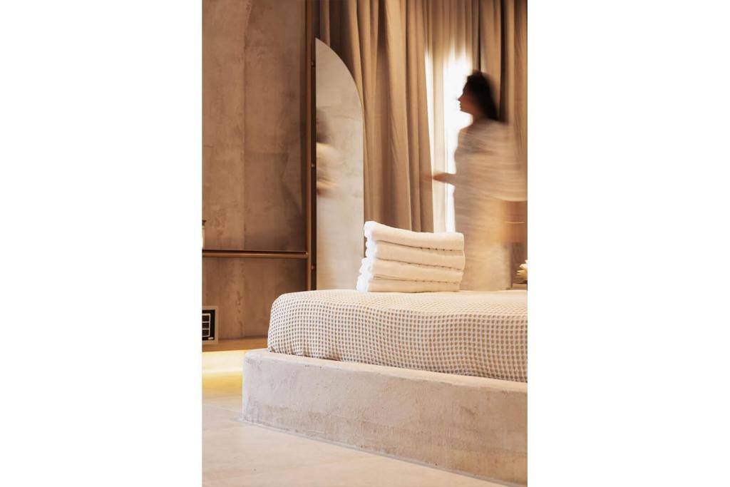 Łóżko lub łóżka w pokoju w obiekcie Medusa Luxury Suites