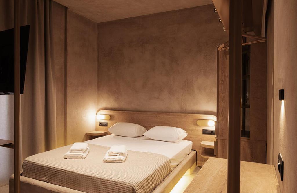 Łóżko lub łóżka w pokoju w obiekcie Medusa Luxury Suites