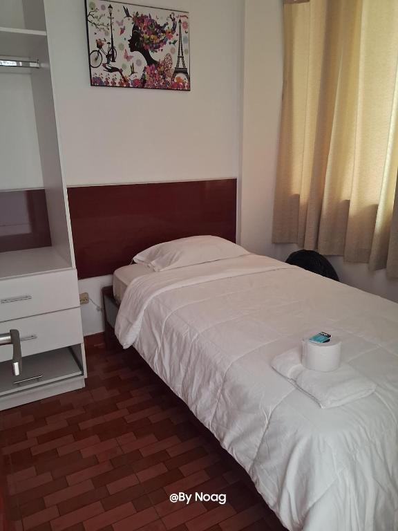 Postel nebo postele na pokoji v ubytování COPACABANA