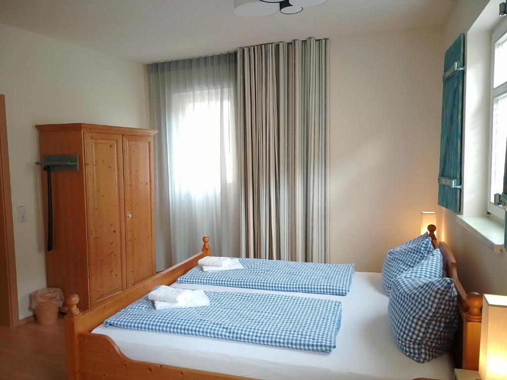 Postel nebo postele na pokoji v ubytování Bed and Breakfast Wehlen
