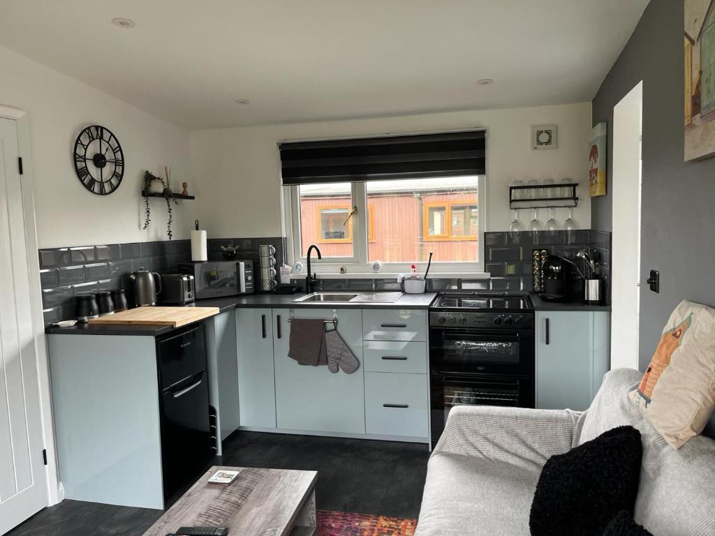 a kitchen with a sink and a counter top at S and S Chalets - 2 - Mablethorpe in Mablethorpe