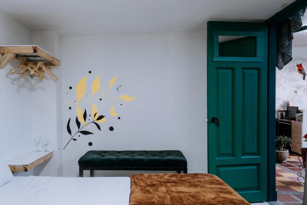 Posezení v ubytování Origen Hostel Jardín