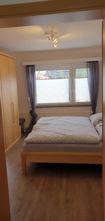 Postel nebo postele na pokoji v ubytování Wohnung Corinchen
