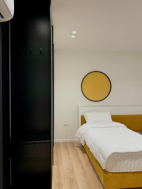 Postel nebo postele na pokoji v ubytování INCASSO CITY CENTER APARTMENT