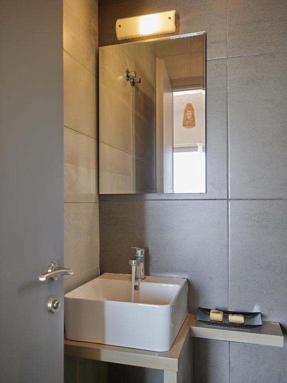 Ванная комната в CICADA HOTEL