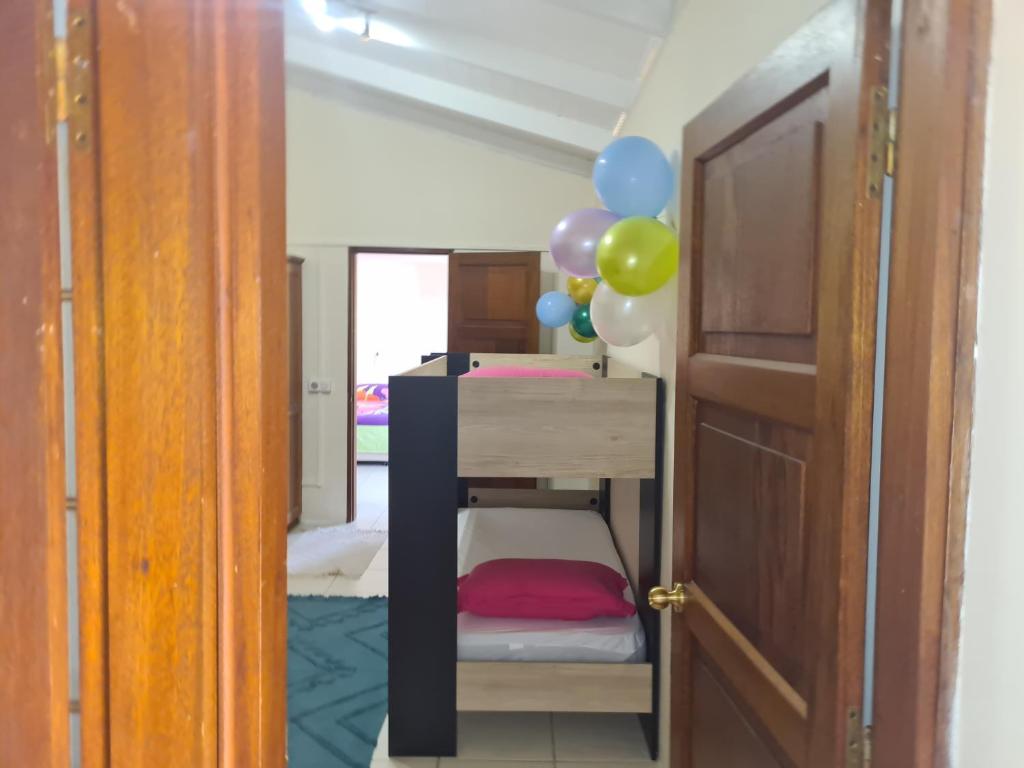 Postel nebo postele na pokoji v ubytování Villa MONOIHERE