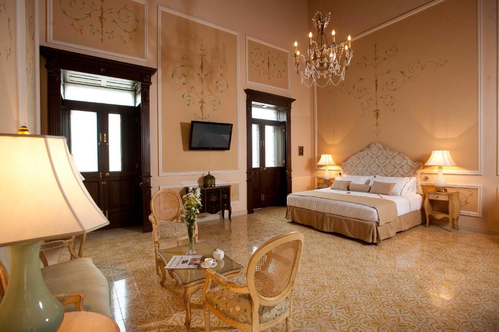 Postel nebo postele na pokoji v ubytování Mansión Mérida Boutique Hotel - Restaurant