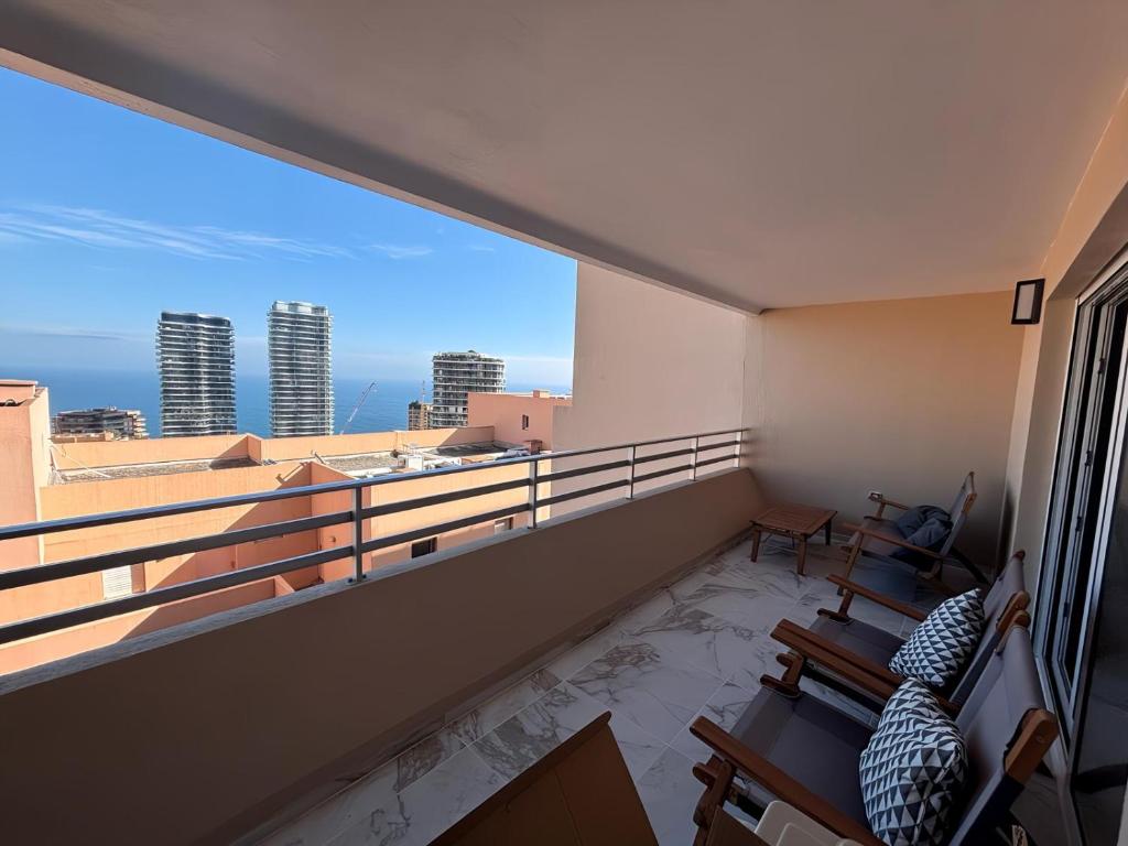 a balcony with a view of the city at Vue Mer à Proximité de Monaco in Beausoleil