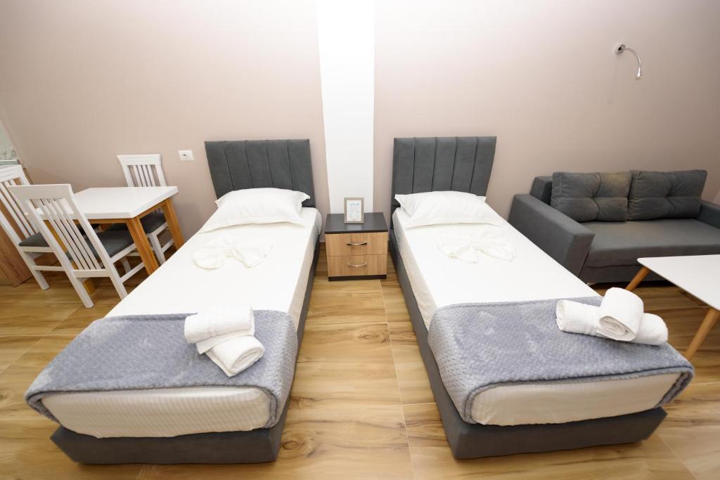 Postel nebo postele na pokoji v ubytování Mezani Guest House