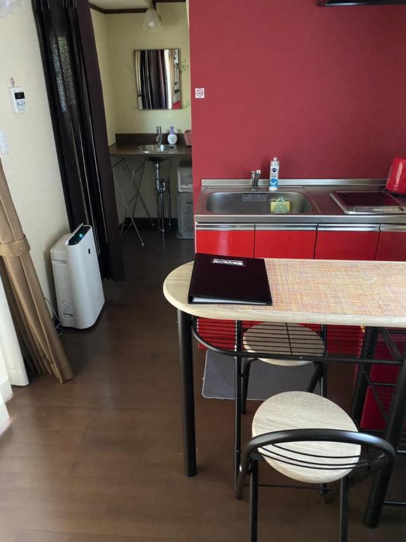 Kuchyň nebo kuchyňský kout v ubytování 森と湖の楽園ＷorkshopＣampＲesort