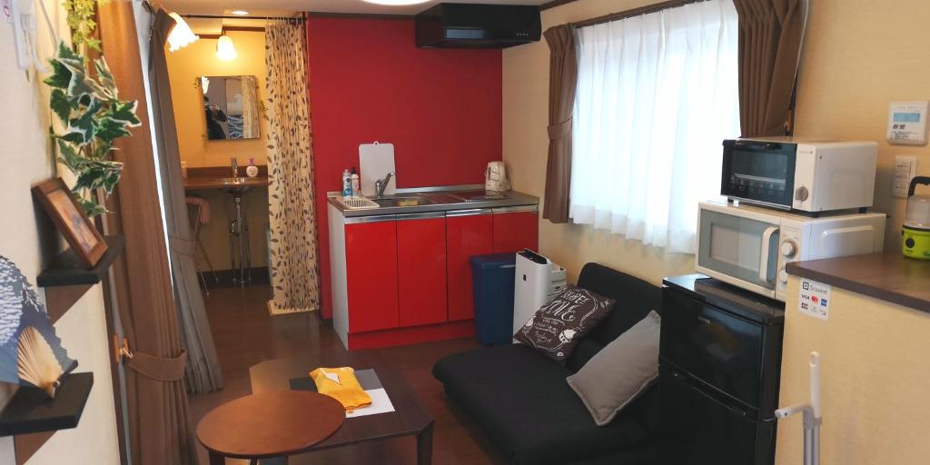 Kuchyň nebo kuchyňský kout v ubytování 森と湖の楽園ＷorkshopＣampＲesort