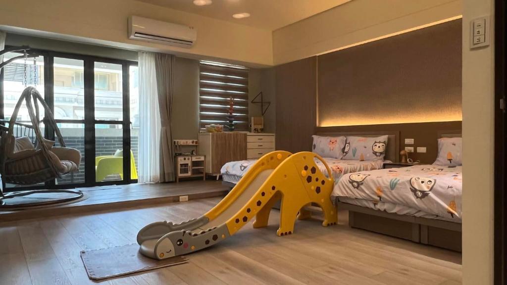 Postel nebo postele na pokoji v ubytování Panda Homestay