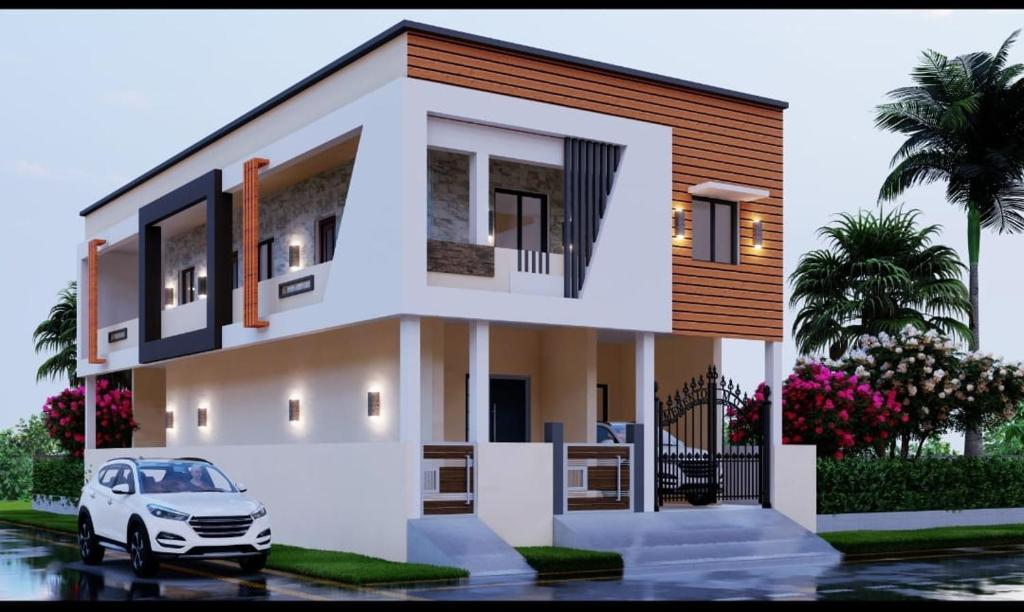 a rendering of a house with a car in front at Thirunallar Heaven Homes in Tirunallār