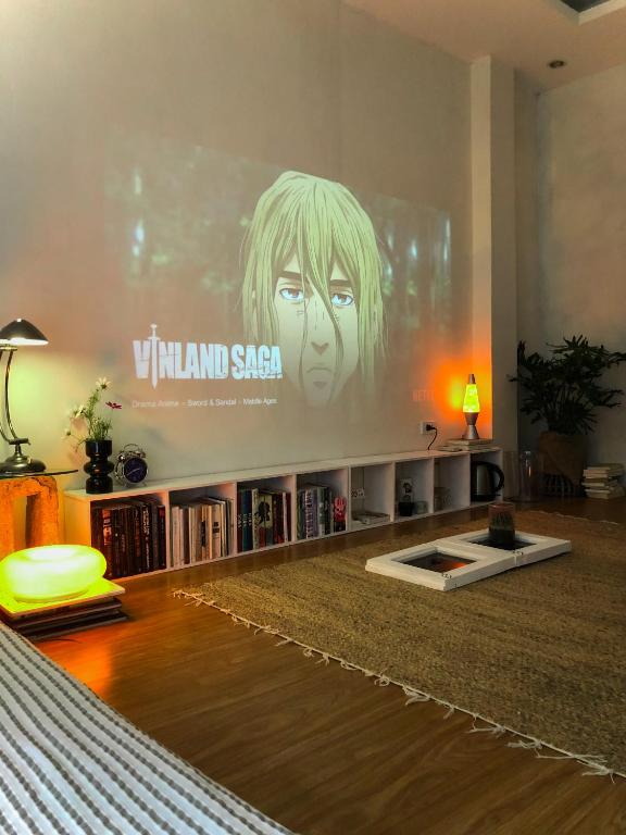 TV a/nebo společenská místnost v ubytování Chơi Như Ở Nhà