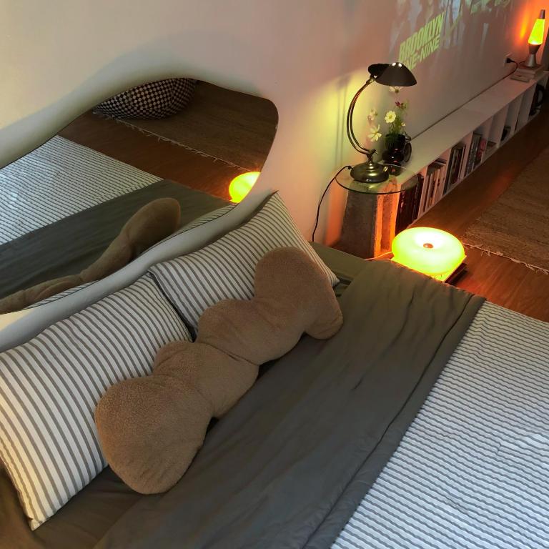 Postel nebo postele na pokoji v ubytování Chơi Như Ở Nhà