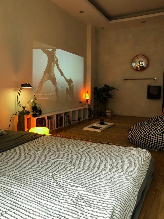 Postel nebo postele na pokoji v ubytování Chơi Như Ở Nhà
