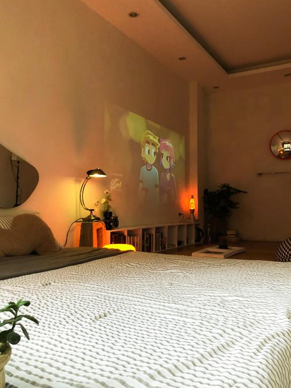 TV a/nebo společenská místnost v ubytování Chơi Như Ở Nhà