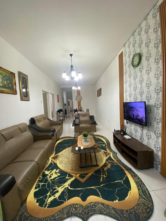 Televisyen dan/atau pusat hiburan di SYA HONEY HOMESTAY with NETFLIX