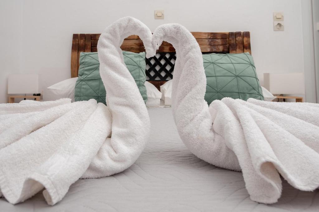 Łóżko lub łóżka w pokoju w obiekcie Pension Stella