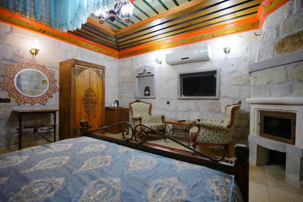 TV a/nebo společenská místnost v ubytování Alaturca House