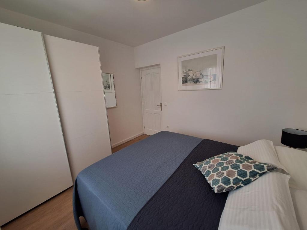 Postel nebo postele na pokoji v ubytování Villa Sirius