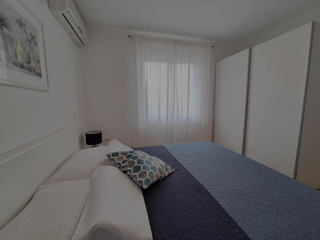 Postel nebo postele na pokoji v ubytování Villa Sirius
