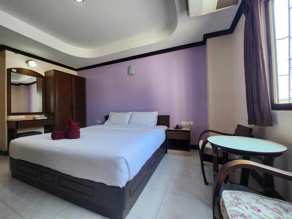 Postel nebo postele na pokoji v ubytování White Rose​ Hotel​ II​