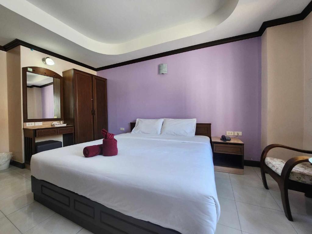 Postel nebo postele na pokoji v ubytování White Rose​ Hotel​ II​