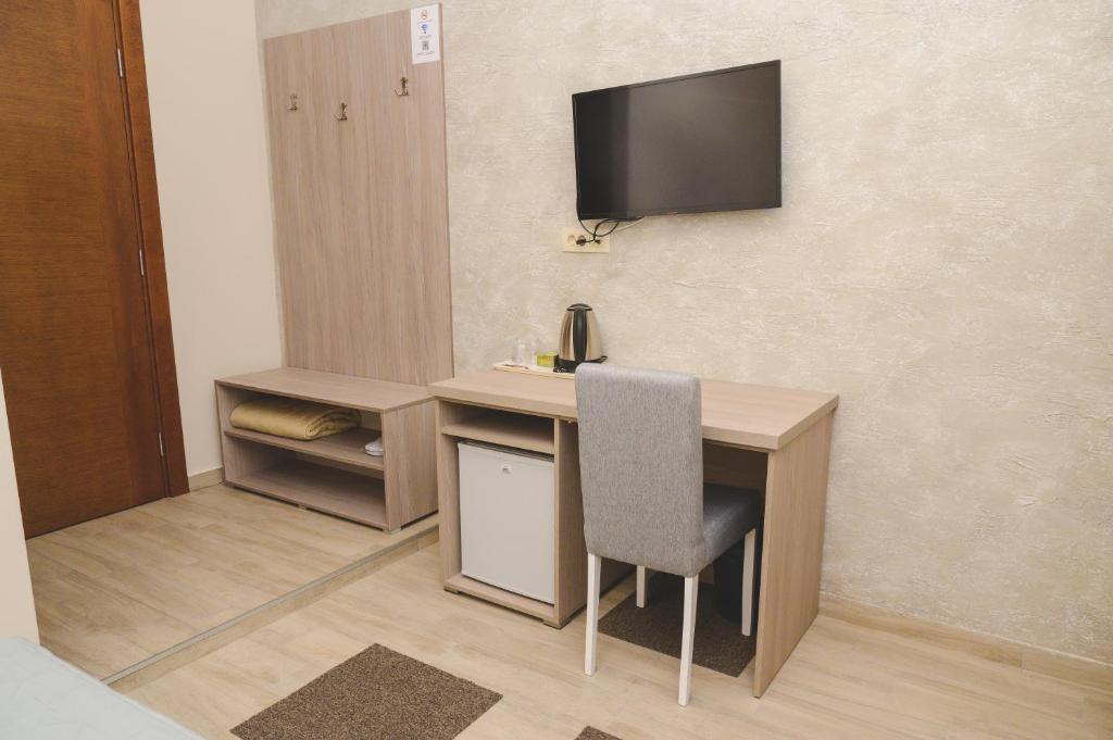 TV a/nebo společenská místnost v ubytování IPN ROOMs