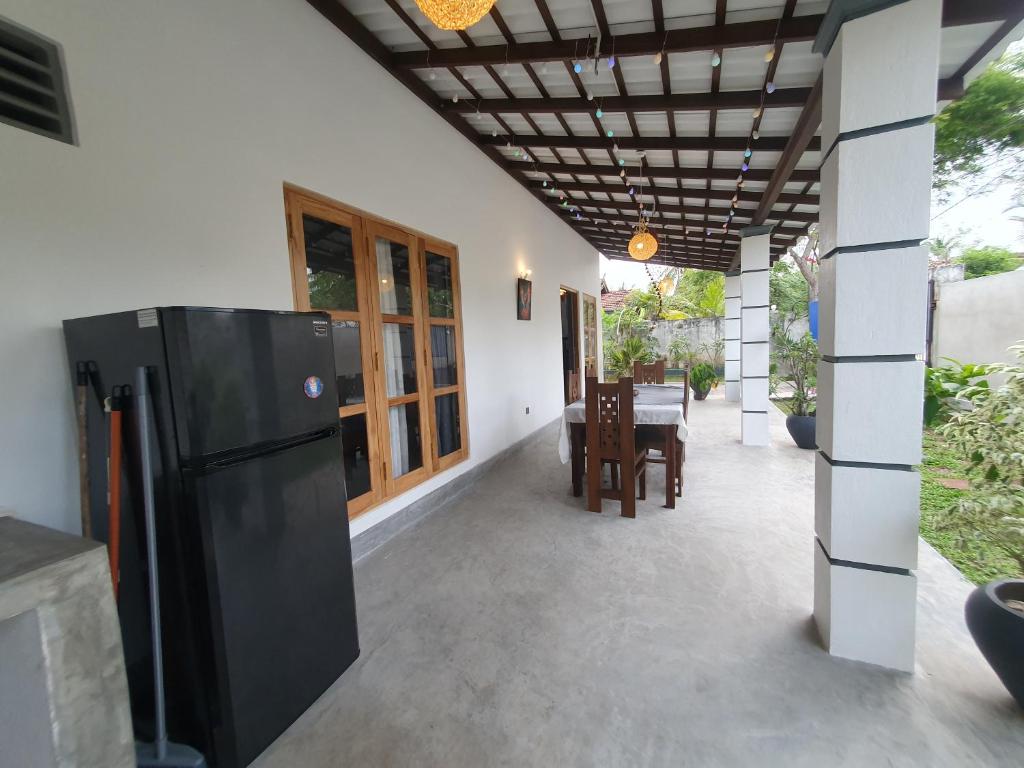 Kuchyň nebo kuchyňský kout v ubytování Mirissa Surf Villa