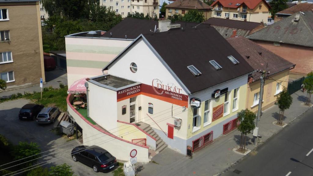 an overhead view of a building in a city at Penzión Dukát in Prešov