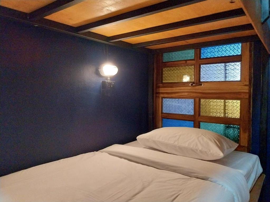 Postel nebo postele na pokoji v ubytování W168 hostel